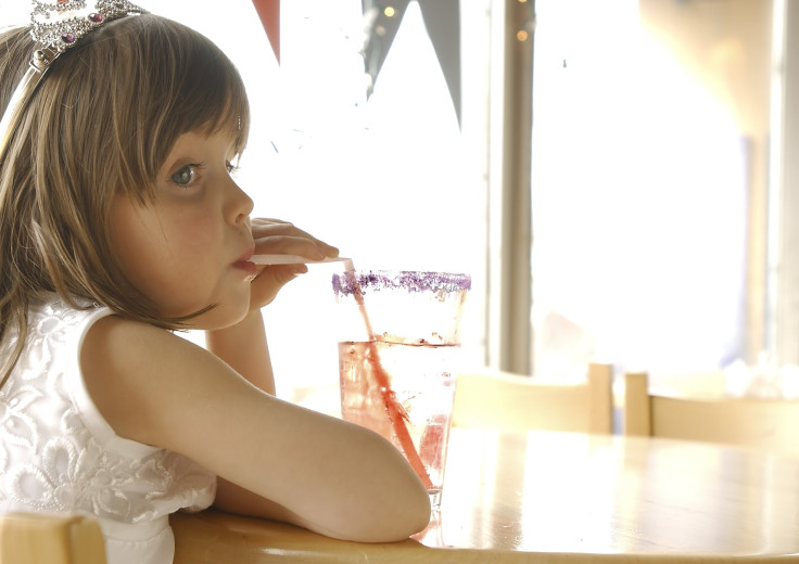 girl drinking soda pop