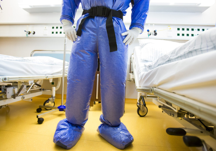 medical professional in 'space suit'