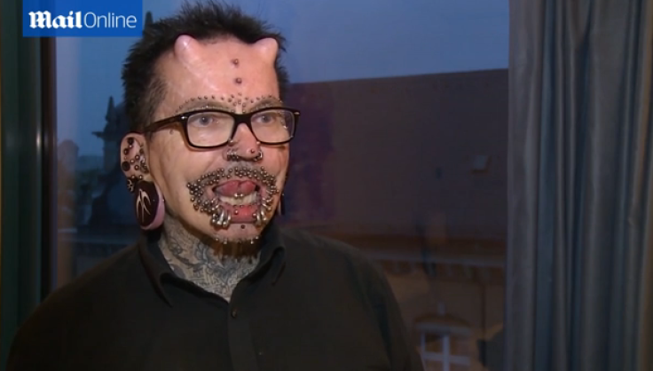 Rolf Buchholz talks about piercings and tattoos 