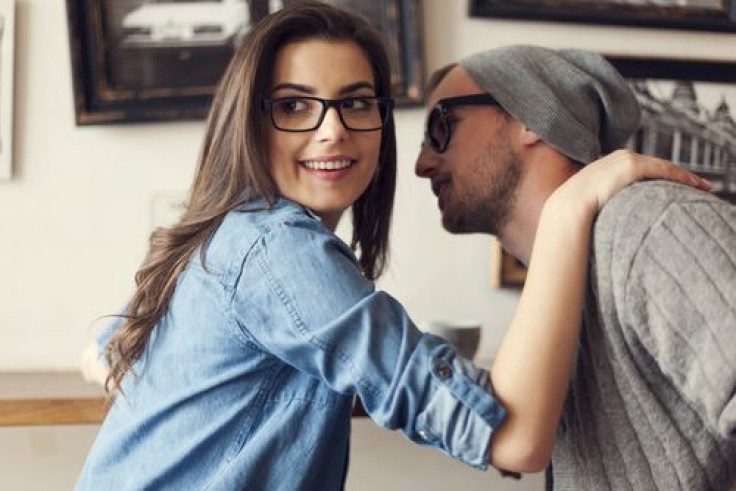 Couple flirting at cafe