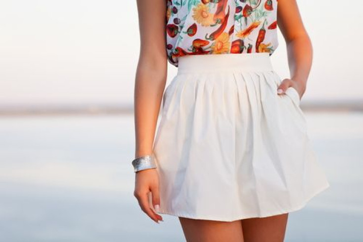 Woman in white skirt