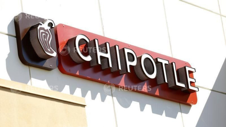 Woman Uses Chipotle Dining Table as a Changing Station