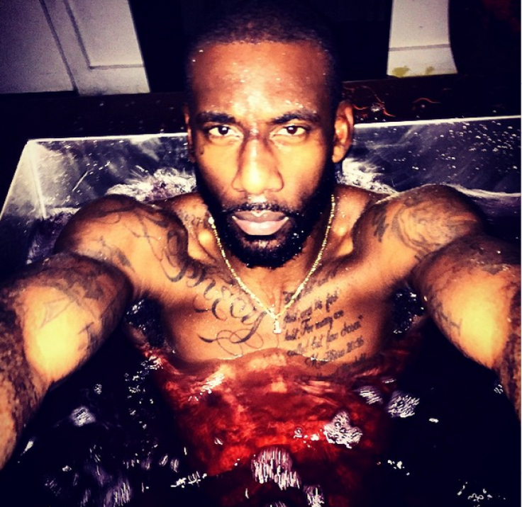 Amar'e Stoudemire taking a red wine bath