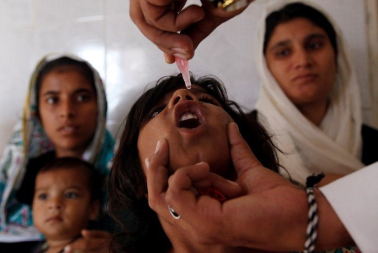 2014-10-26T210431Z_1_LYNXMPEA9P0HF_RTROPTP_3_PAKISTAN-POLIO