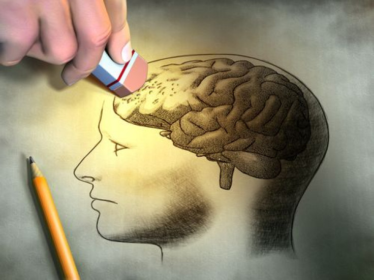 Someone is erasing a drawing of the human brain