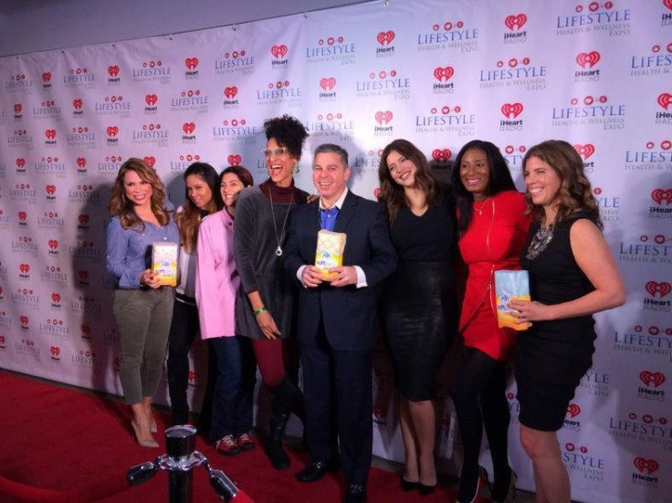 iHeartRadio personalities and health experts pose with Puffs SoftPacks