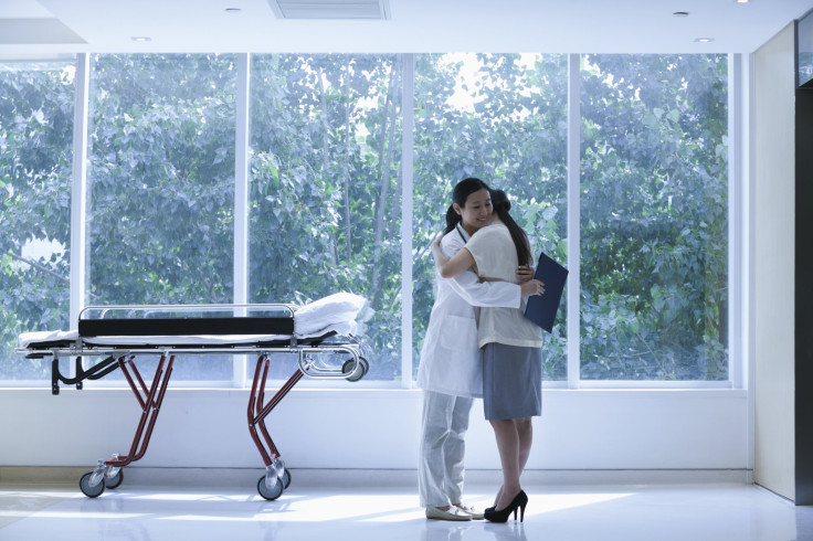 doctor hugging patient