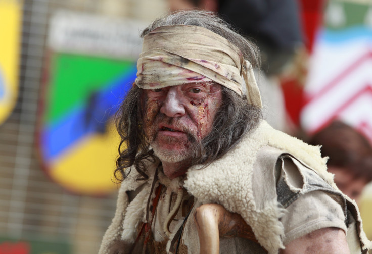 man dressed as medieval peasant