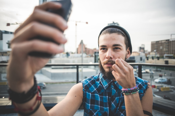 Man taking a selfie in the city