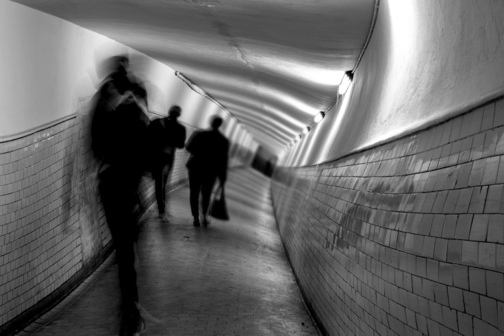 Blurry tunnel with people 