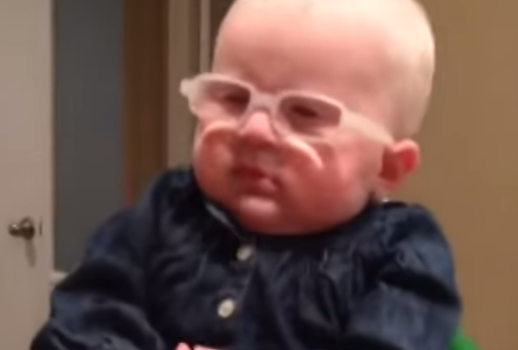 Baby Louise sees mom for the first time with special eyeglasses