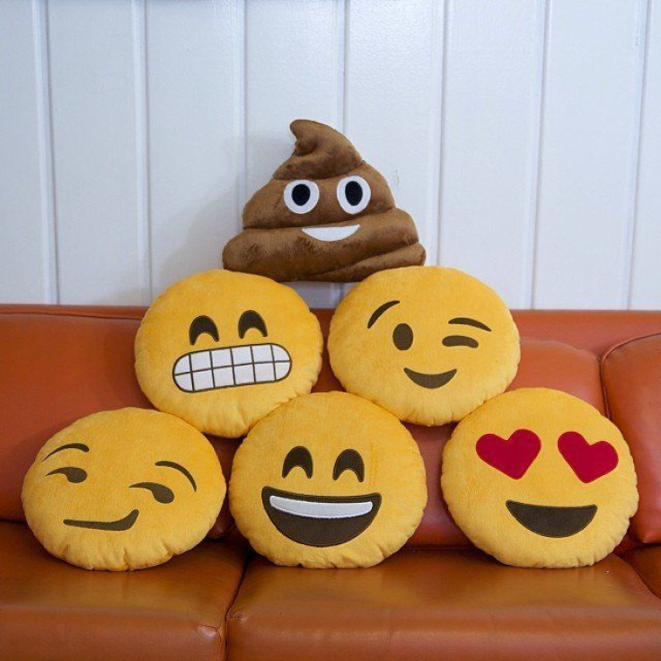 Emoji pillows on couch