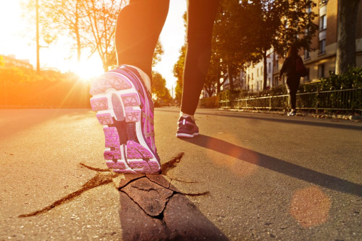 Woman running on pavement