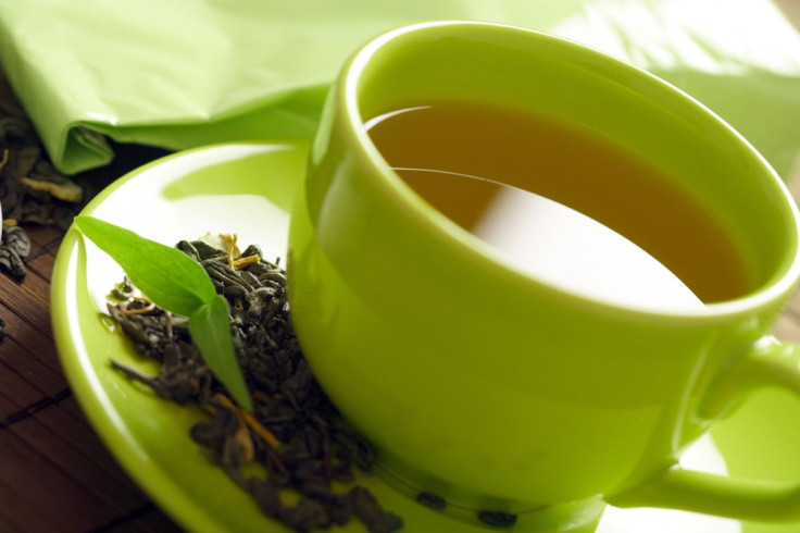 Healthy green tea cup with tea leaves