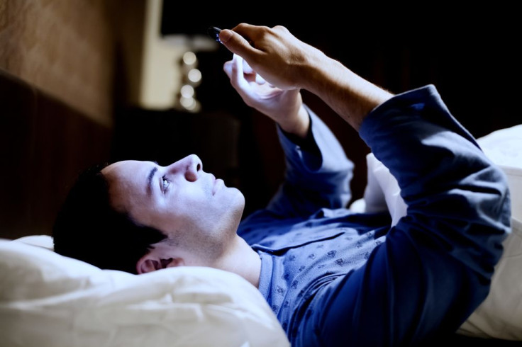 smartphone in bed