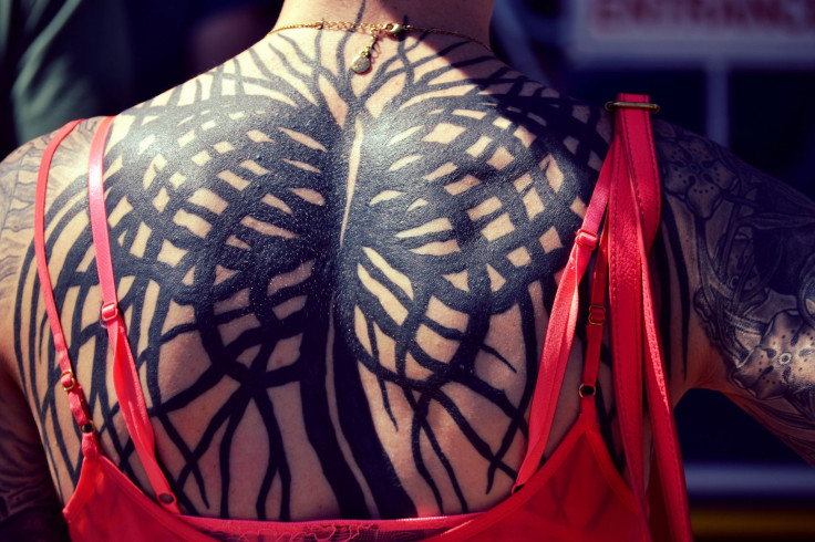 Woman with back tattoo