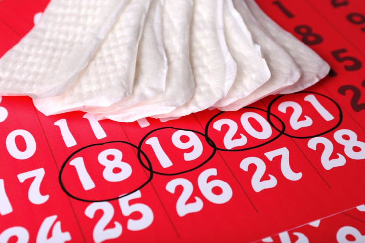 Sanitary pads on red calendar