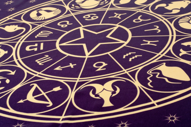 Wheel of Zodiac symbols printed on textile