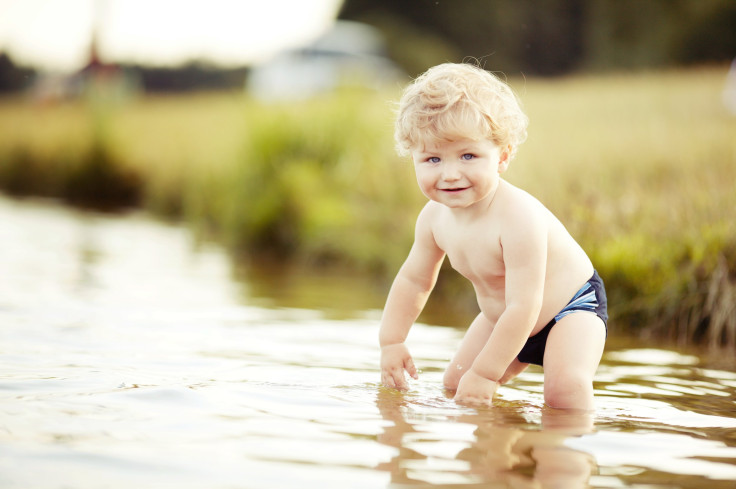 Kids Swimming In The Lake 