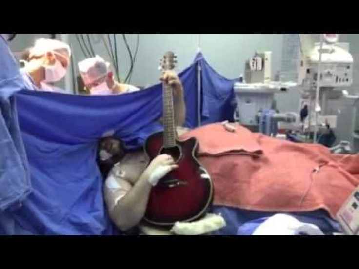 Brain Surgery Patient Plays 'Beatles' Song On Guitar In The Middle Of His Operation