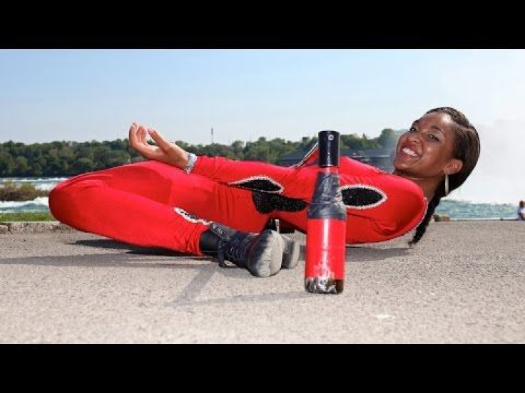 Watch Limbo Queen, Shemika Charles, Shimmy Under A Car To Set World’s First Record Attempt