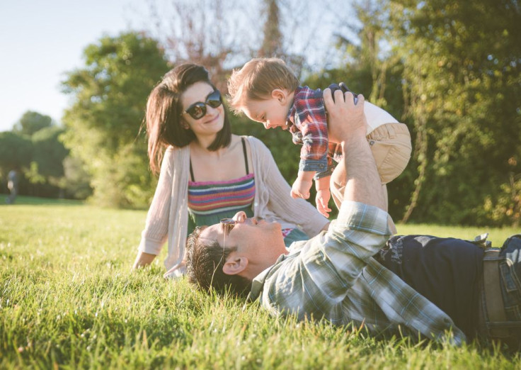 Parents with child on grass