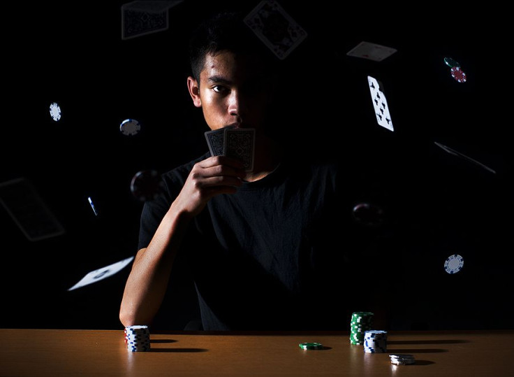 Teen playing poker