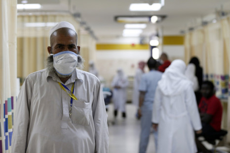 A Muslim pilgrim wears a protective mask in the emergency department at Al-Noor Specialist Hospital in Mecca September 30, 2014.
