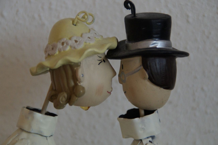 Woman and man figurines 