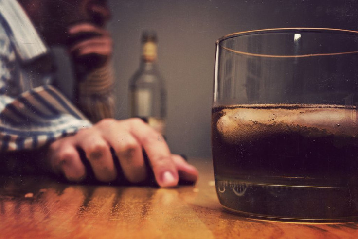 Man with glass of whiskey