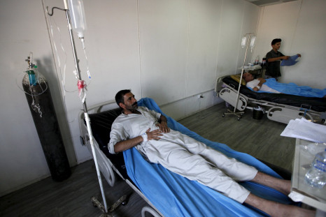 An Iraqi man suffering from cholera waits for medical treatment at a hospital in Baghdad, September 21, 2015.