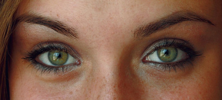 A pair of green eyes. 