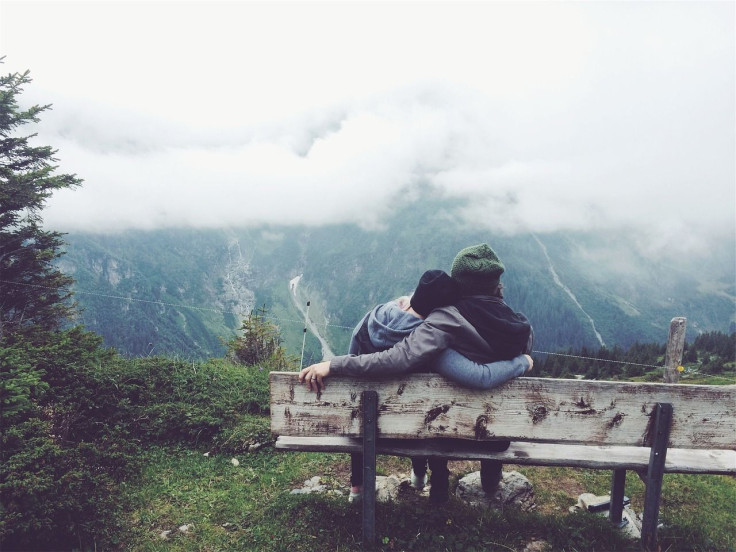 Couple cuddling on bunch