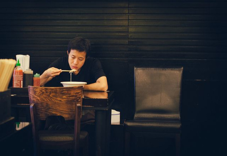 Man eating alone