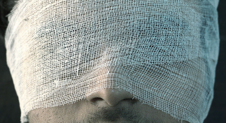 Man in head bandage