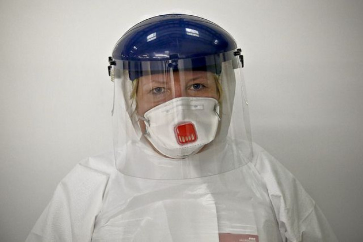 health care worker in safety suit