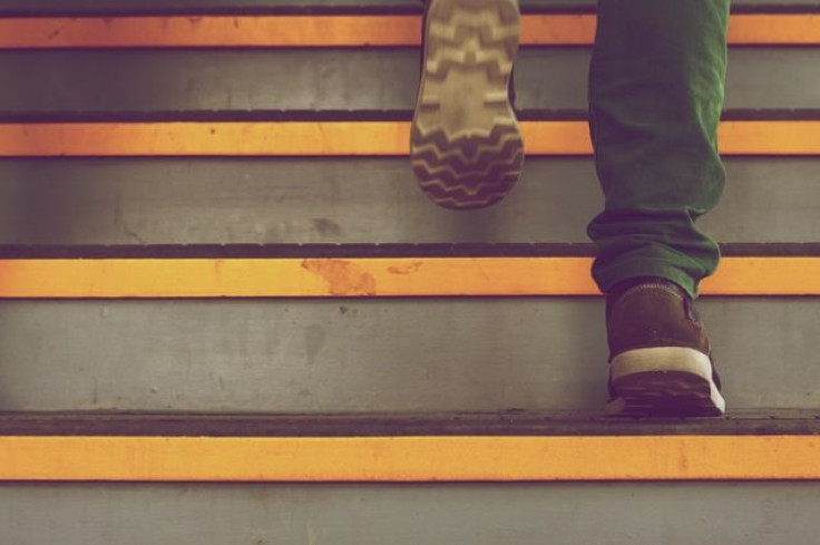 Man walking up the stairs