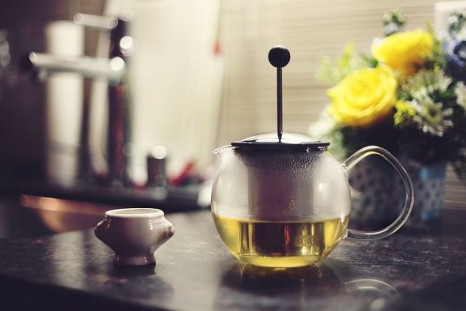 Consuming green tea along with dietary iron may actually lessen green tea's benefits, study finds.