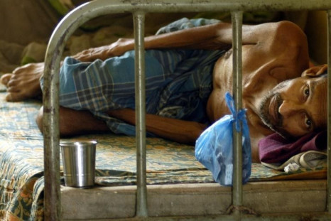 A patient suffering from Tuberculosis rests inside a hospital in Agartala, March 24, 2009.