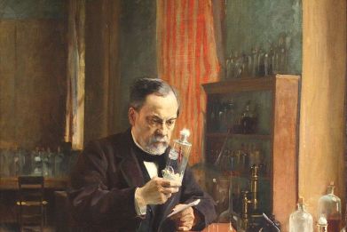 Louis Pasteur, who is credited with creating the vaccines for chicken cholera, anthrax, and rabies, is shown in his laboratory.