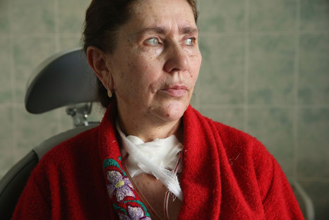 Rosa Tsaryevna, 60, recovers from surgery to her thyroid at the oncology clinic on April 6, 2016 in Gomel, Belarus.