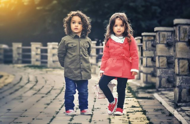 Boy and girl standing together