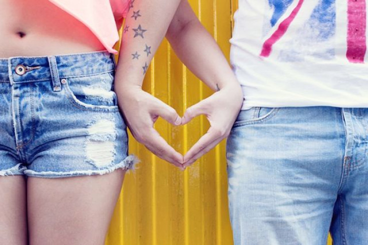 Man and woman touching hands