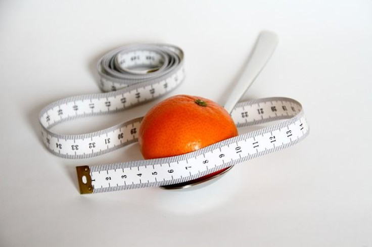 Fruit with measuring tape around