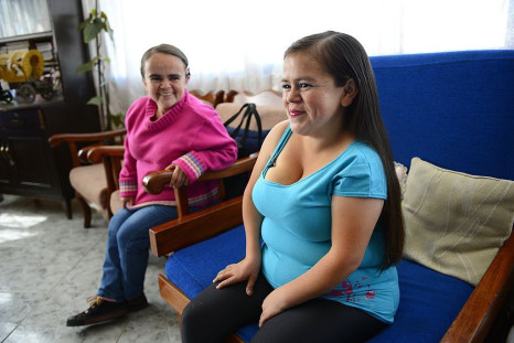 Ecuadorean Maritza Valarezo (R) and her sister Lugartda, both with Laron syndrome on Jan. 17, 2014.