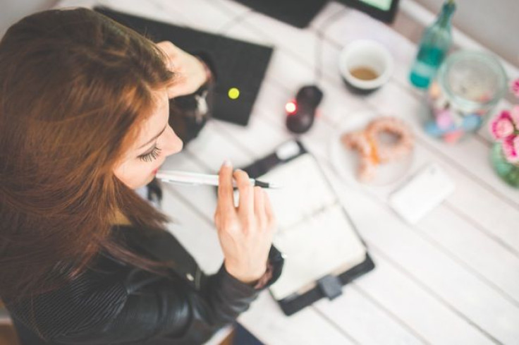 Woman sitting at office desk