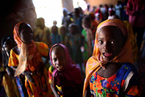 Sudanese refugee children sing at a classroom in a Sudanese refugee camp in Gaga, eastern Chad, near the border with Darfur, November 17, 2007.