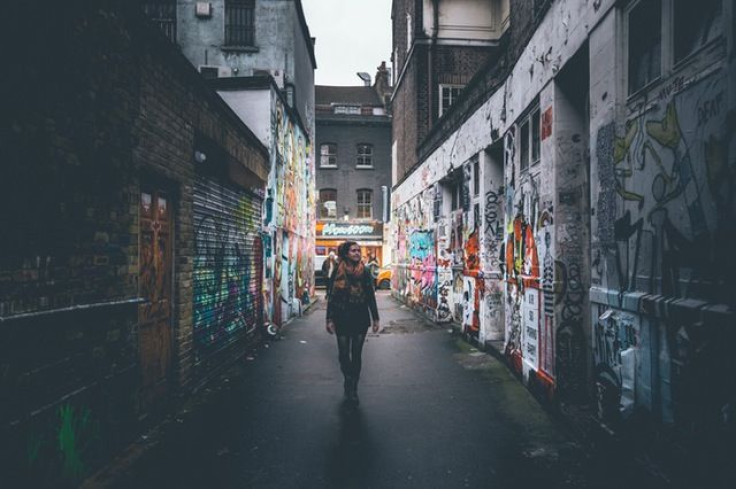 Woman in alleyway 