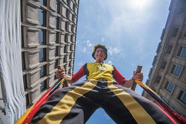 Man on stilts