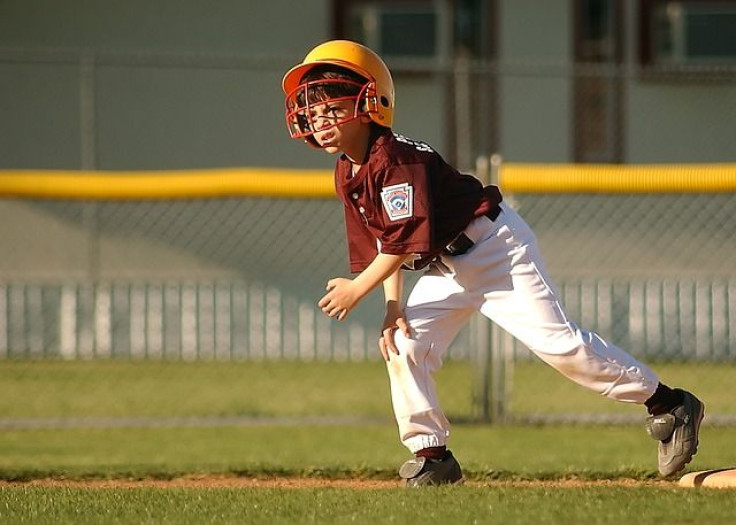 Child playing baseball